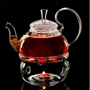 Стеклянный заварочный чайник с подставкой Lama home glass фото